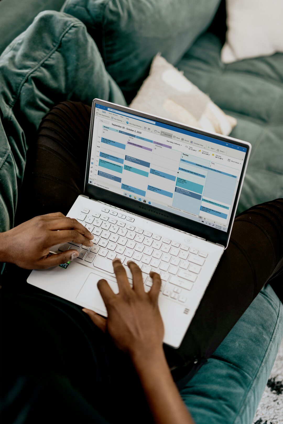 person reviewing budget on laptop