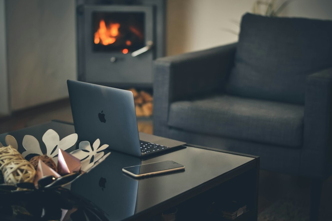 Person studying a finance course on a laptop at home